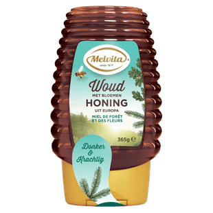 Melvita Woudhoning met bloemen