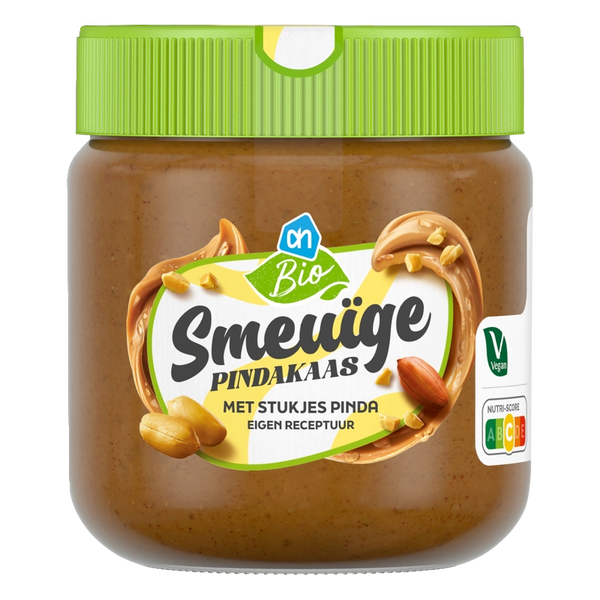 Biologische cremige Erdnussbutter mit Erdnussstückchen